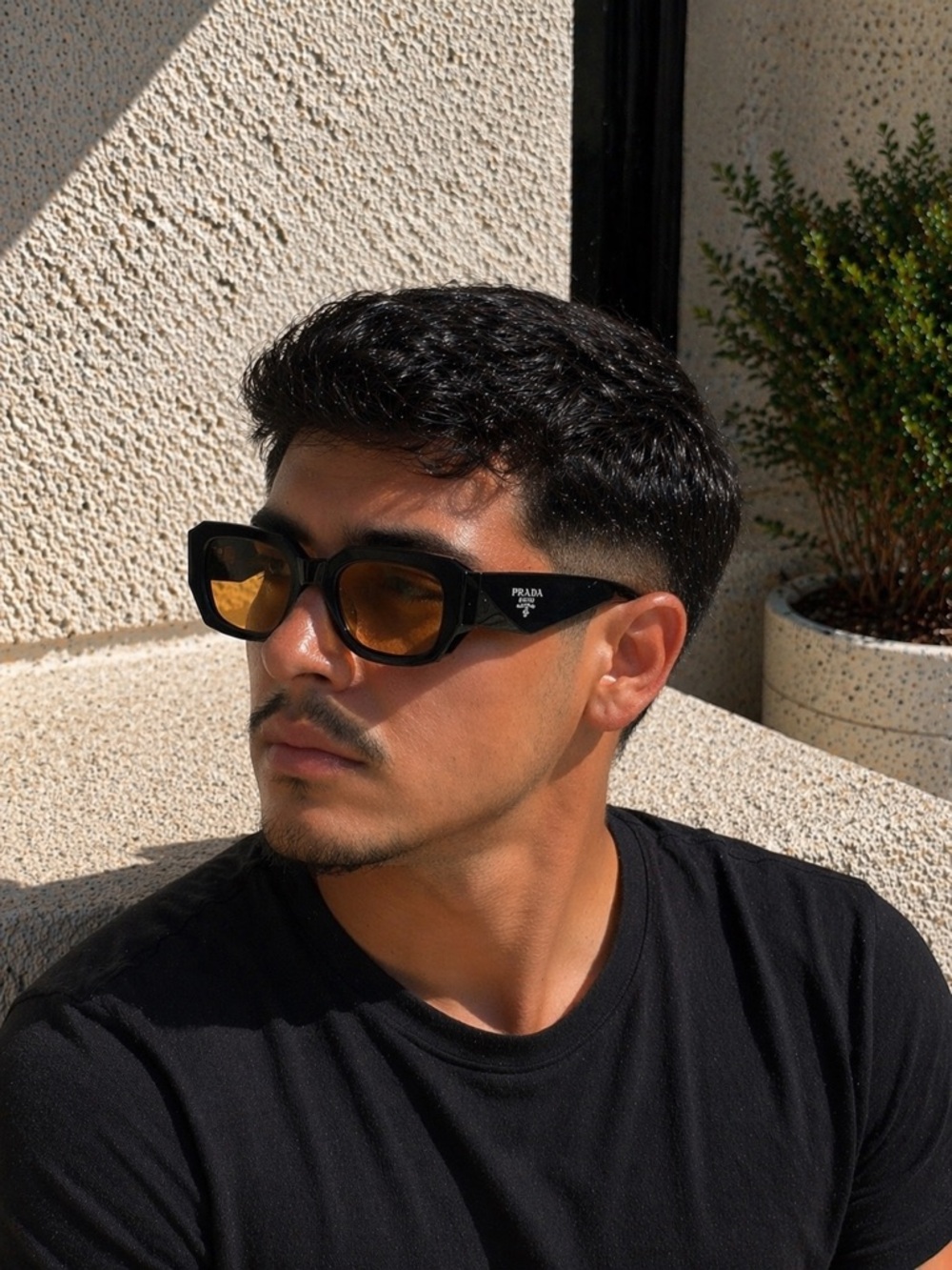 Prada Black Frame Sunglasses with Yellow Lenses - Picture 2 of 4